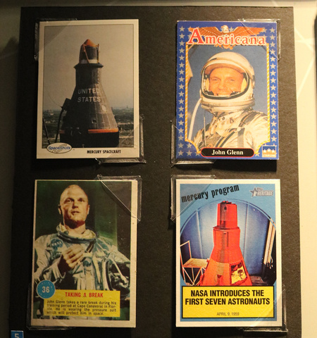 four bubble gum trading cards with images of John Glenn in space suit and Friendship 7 space craft