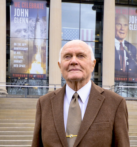 Sen. John Glenn standing outside in front of Page Hall at Ohio State