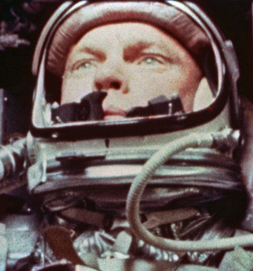 close up photo of John Glenn wearing space helmet