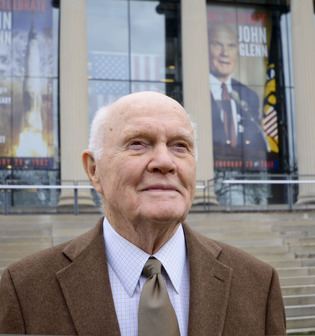Sen. John Glenn standing outside in front of Page Hall at Ohio State