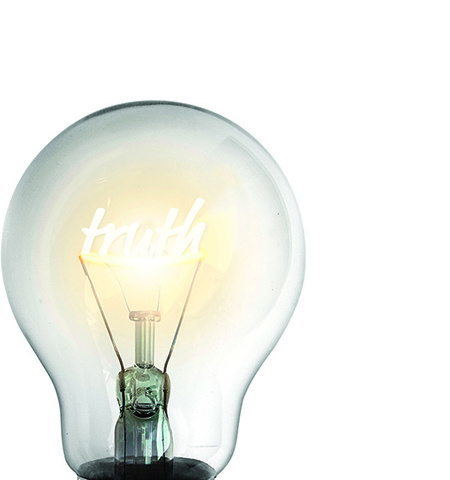 a clear lightbulb with the word “truth” glowing in the yellow center