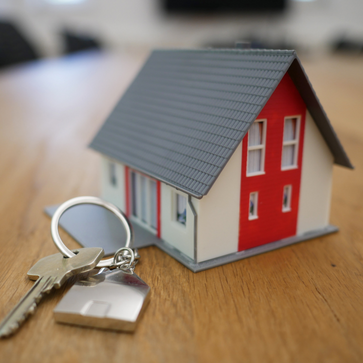 small red house with keys