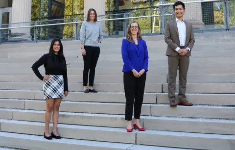 college faculty on steps