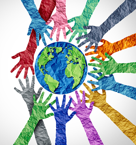 an illustration of bright, multicolored hands with a crinkled paper texture reaching out around and toward a blue and green planet Earth, also with a crinkled paper texture