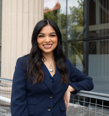 Glenn College undergraduate student Lauren González standing outside in front of Page Hall