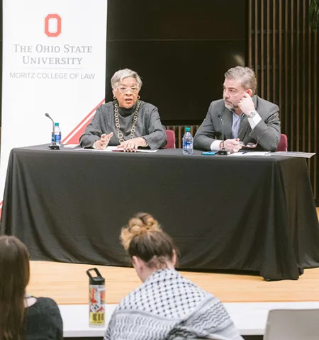 Rep. Joyce Beatty (left) responds to a question as Rep. Mike Carey listens.