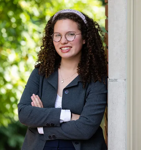 Glenn College public policy analysis and political science major student Cordelia Van der Veer standing outside