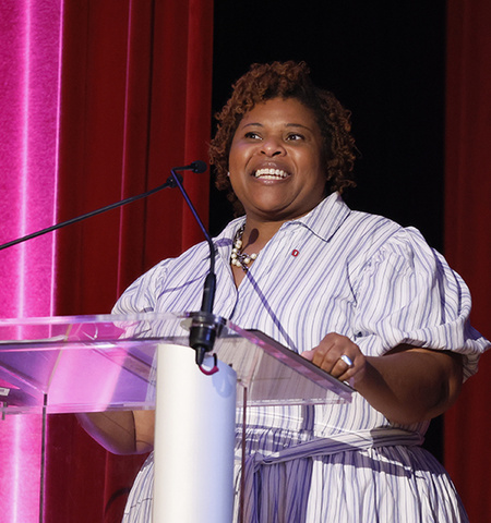 Wendy Smooth, Ohio State’s senior vice provost for inclusive excellence, stands behind a lectern and speaks at the African American Behavioral Health Conference.