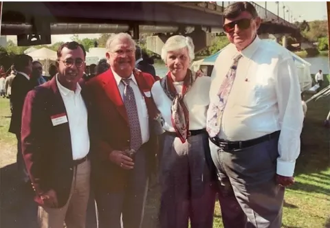 Herb Asher, Professor Emeritus of political science and Distinguished Adjunct Professor in the John Glenn College of Public Affairs, left, poses outside for a 1995 photo with (from left) former Ohio House Speaker Vern Riffe, then-Ohio House Speaker Jo Ann Davidson and Corwin Nixon, longtime former minority leader of the Republican Party in the Ohio House.