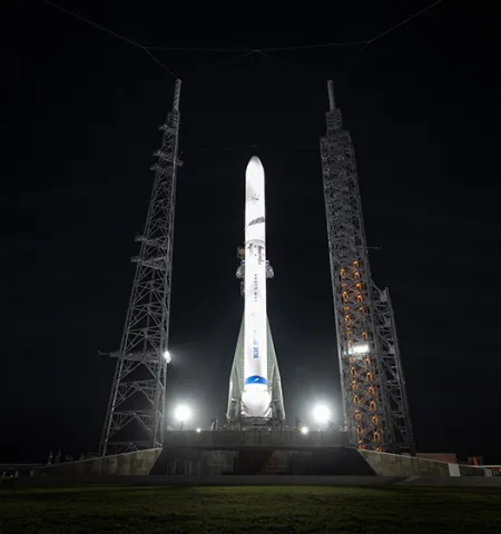 Blue Origin’s New Glenn rocket lit up at night at its launch site at Cape Canaveral Space Force Station